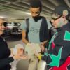 6ix9ine Gives $25,000 to Two Deserving Families
